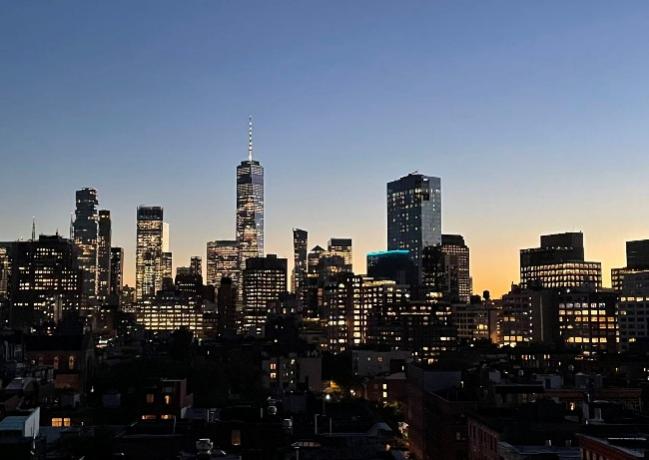 A city skyline at night
AI-generated content may be incorrect.